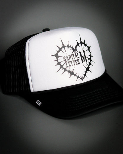 Black Logo Trucker Hat